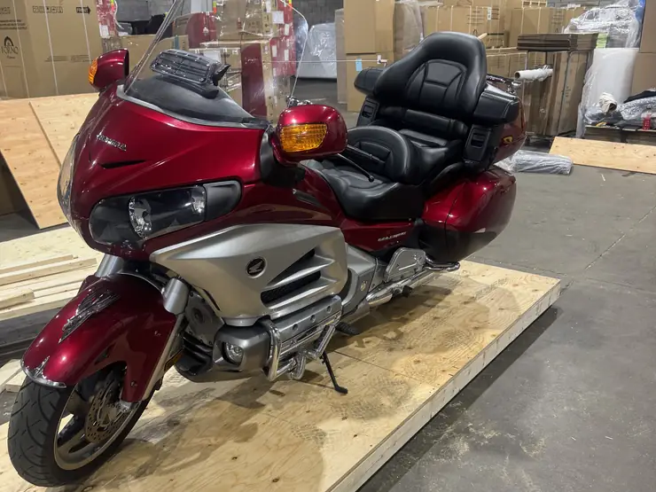 Motorcycle secured inside a custom-built wooden crate